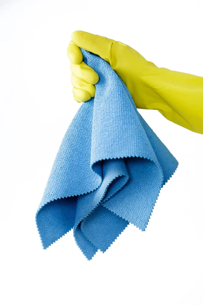 Cleaning Garage Door Sensors with Soft Microfiber Cloth Gloves